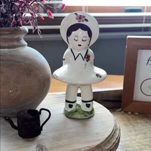 Vintage Ceramic Figurine with Floral Accents